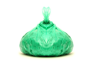 Green rubbish bag isolated on white