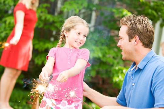 Summer: Dad Teaches Girl To Use Sparklers