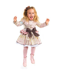 Little girl with beautiful dress jumping