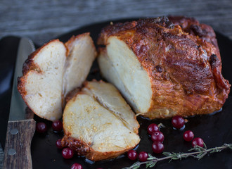 baked meat with cranberries and thyme
