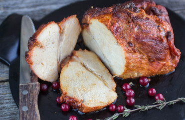 baked meat with cranberries and thyme