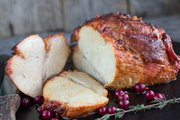 baked meat with cranberries and thyme