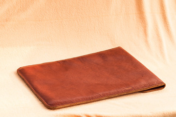 Vintage elegant brown leather briefcase for laptop computer.