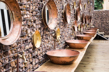 camping public toilets with hand made sinks and mirrors