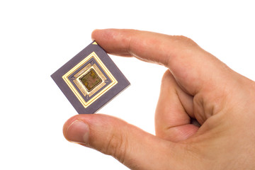 Microprocessor in hand isolated on white