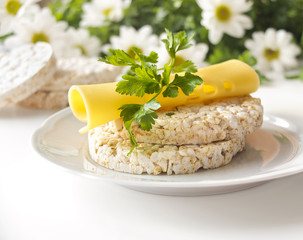 Rice cakes with cheese, parsley and chamomile
