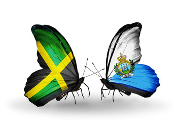 Two butterflies with flags Jamaica and San Marino