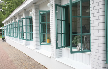 brick wall with open windows