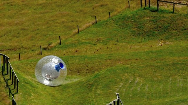 Ball rolling Zorbing in Rotorua, New Zealand.