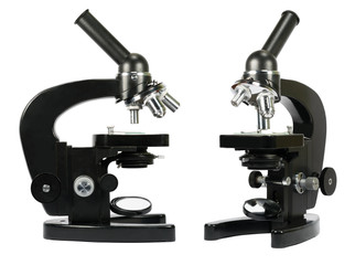 Two microscopes isolated on white