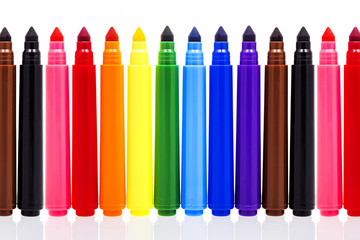 Colored markers isolated on white background