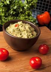 Guacamole with tomatos