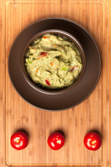 Guacamole with tomatos
