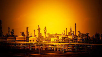 refinery with smoke stacks