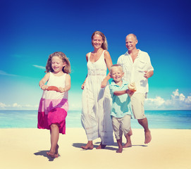 Fototapeta na wymiar Family Running Playful Vacation Beach Holiday Concept