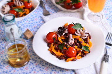 Salad of cooked beans, vegetables and octopus