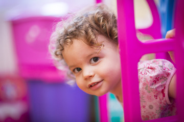 Little Girl Playing At Home