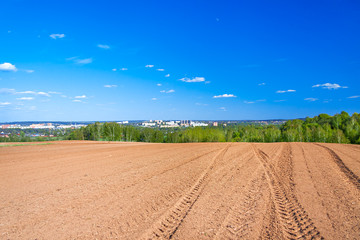 Fototapeta na wymiar agricultural arable land field in the spring