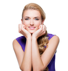 Obraz premium Beautiful smiling woman with long blond curly hair.