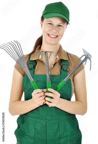 "Gärtner in grüner Latzhose mit GartenWerkzeugen" Stockfotos und