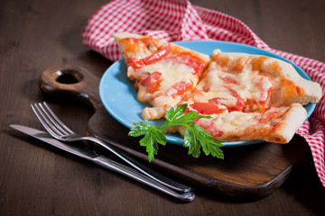 Delicious italian pizza served on wooden table