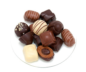 chocolate candies over white