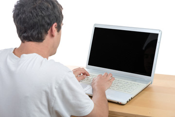 Fototapeta na wymiar young man working with his laptop