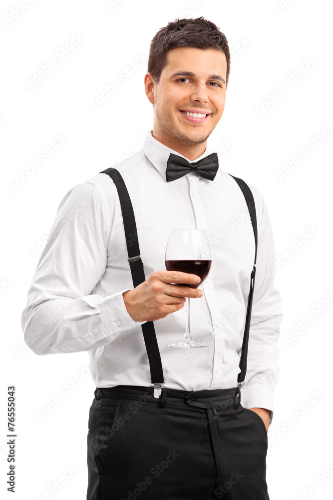 Poster handsome young guy drinking red wine