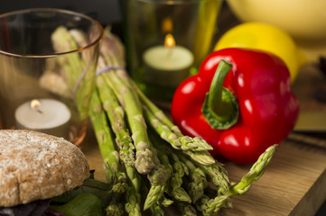 Fresh green asparagus spears with red bell pepper