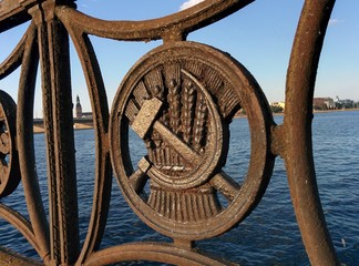 Ornament sickle and hammer metal fence waterfront