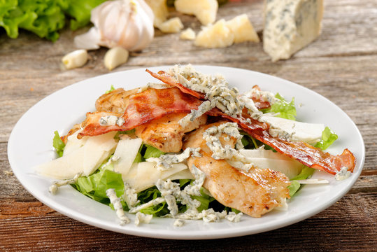 Bowl of Traditional Caesar Salad with Chicken and Bacon
