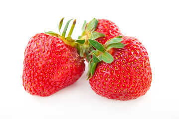 fresh strawberry with leaf isolated on white