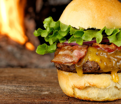 Gourmet Bacon Cheeseburger With Lettuce And Tomato