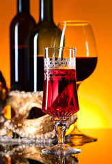 Venetian masks and red wine