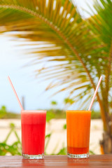 Fruit juices on tropical beach
