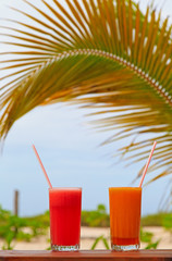 Fruit juices on tropical beach