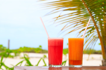 Fruit juices on tropical beach
