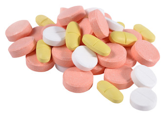 Obraz na płótnie Canvas Heap of colorful pills on a white