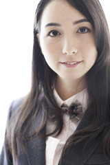 Naklejka premium 制服姿の女子学生の表情