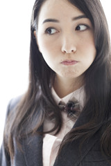 Obraz premium 制服姿の女子学生の表情