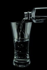 pour the water into a glass