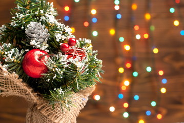 Fototapeta na wymiar Christmas tree with toys on garland background