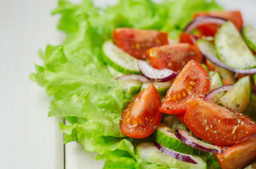 salad with cucumbers and tomatoes olive oil