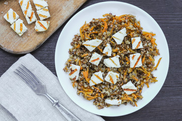 Buckwheat with carrot and  fried chopped adygei cheese