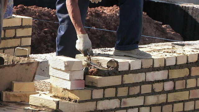Construction townhouse, work bricklayer, masons