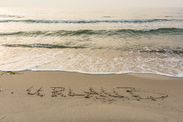 Schriftzug am Strand