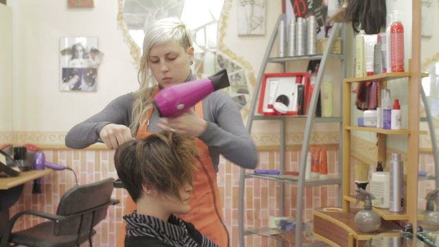 A brown-head model gets her hair straight - hairdresser - hairstylist