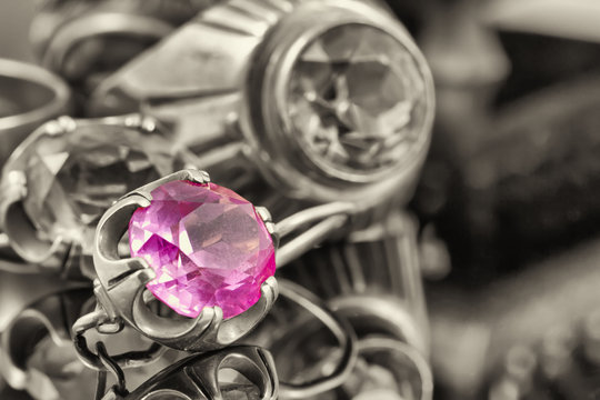 Gold earrings and a ring with ruby