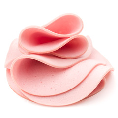 cooked boiled ham sausage or rolled bologna slices isolated on w © Natika