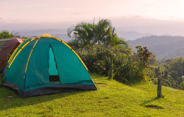 Camping tent in campground at national park with sunrise